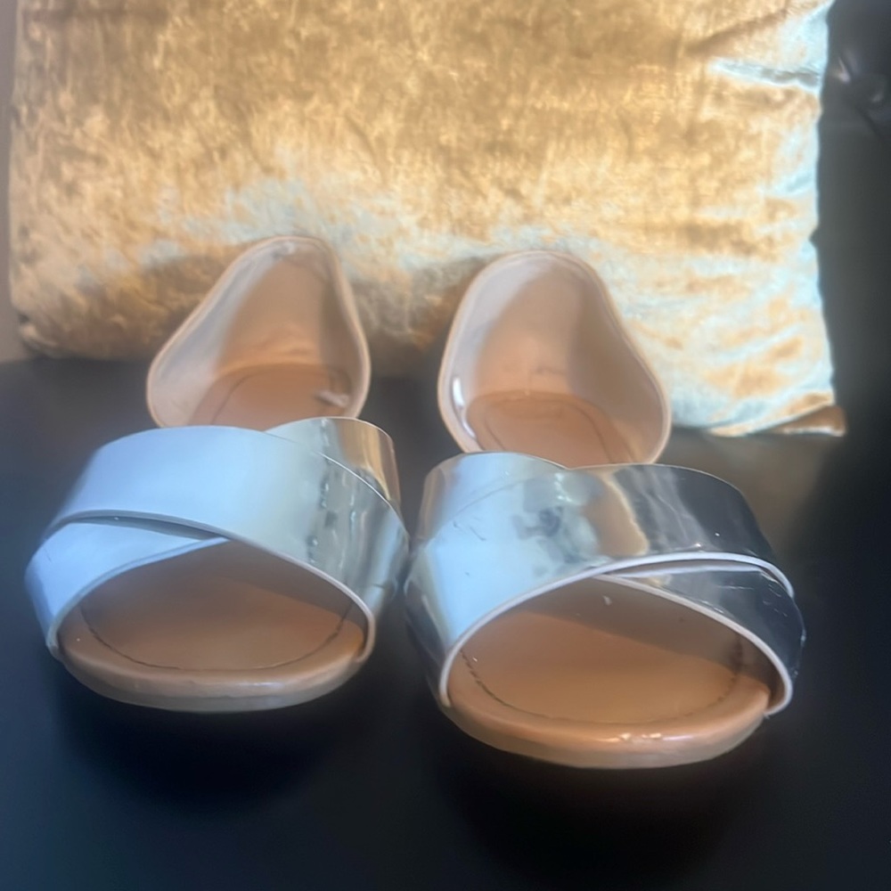 Preowned Express flats nude and metallic silver. Size 10.